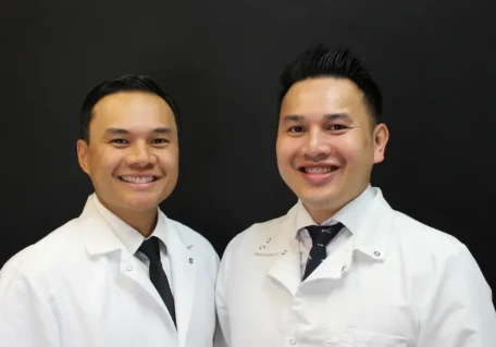 Dr. Huynh brothers smiling together